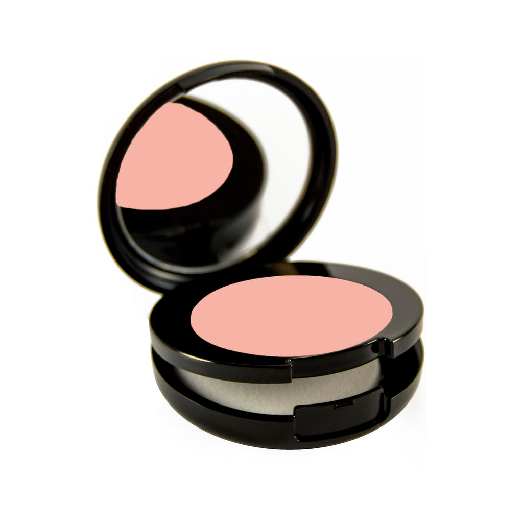 Csardas Petite Bio-Fond Compact. Round black mirrored compact with a compartment for a makeup sponge under the makeup.