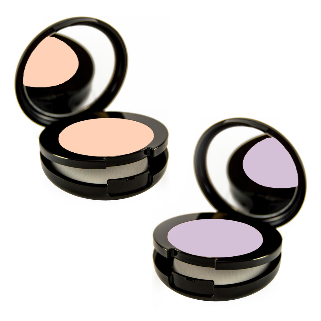 Two Black compacts facing each other- one with Highlighter concealer, the other with Lilac Color Correcting concealer