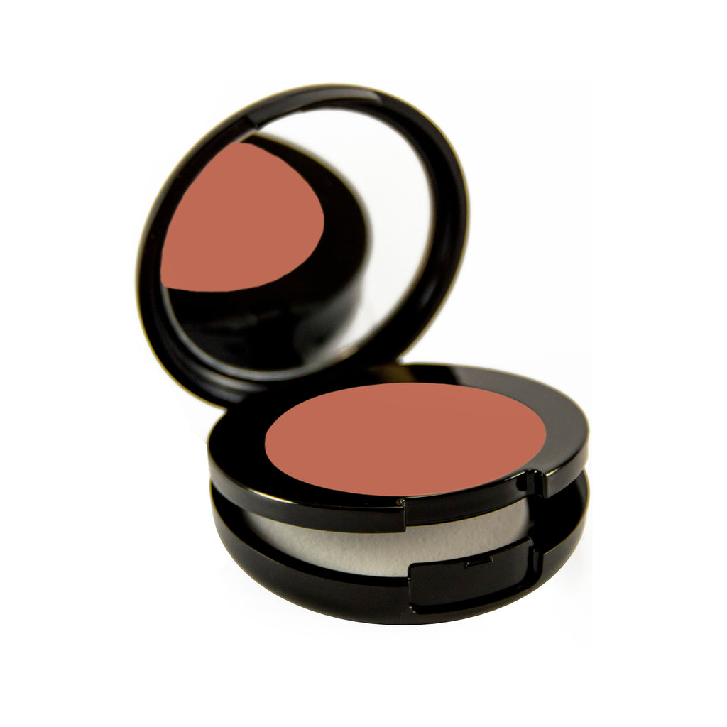 Bronze Special Petite Bio-Fond Compact. Round black mirrored compact with a compartment for a makeup sponge under the makeup.
