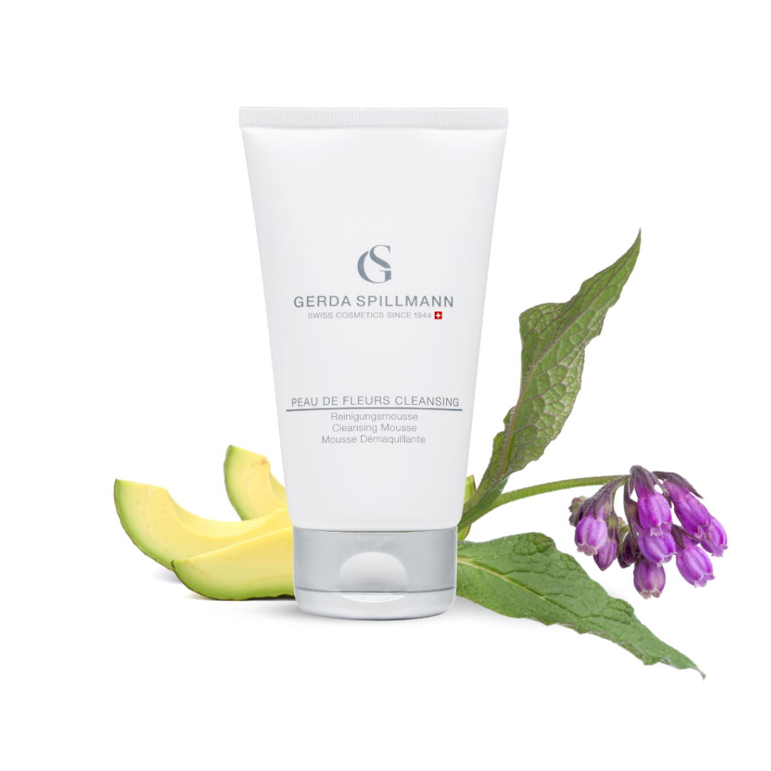 Tube of Gerda Spillmann skincare product Peau de Fleurs Cleanser with avocado, leaves, and flowers on a white background