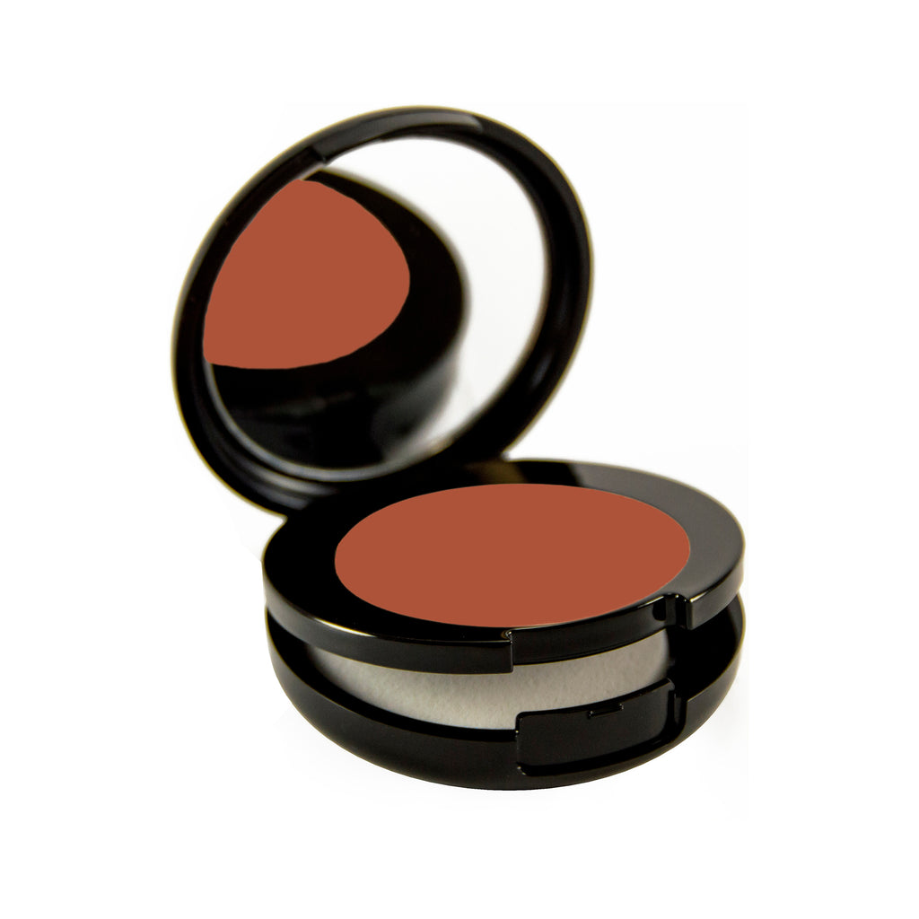 Autumn Petite Bio-Fond Compact. Round black mirrored compact with a compartment for a makeup sponge under the makeup.