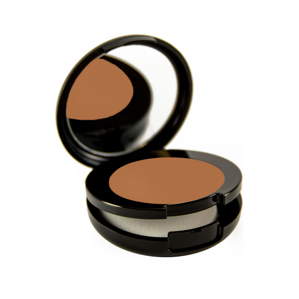 Light Ebony Petite Bio-Fond Compact. Round black mirrored compact with a compartment for a makeup sponge under the makeup.
