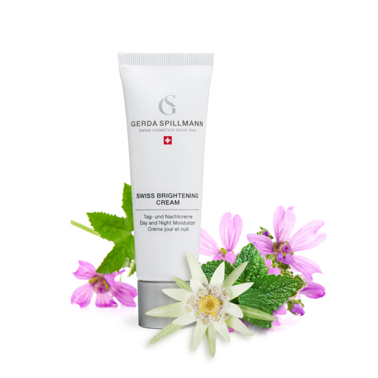 Tube of Gerda Spillmann Swiss Brightening Cream with flowers on a white background